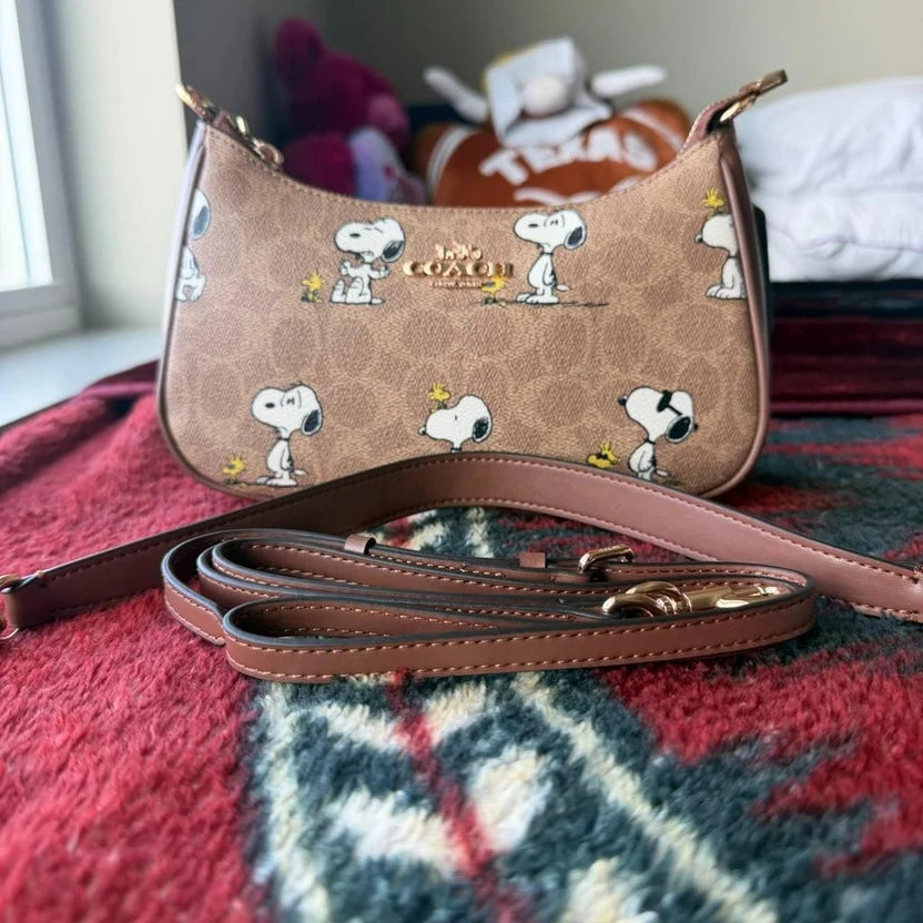 3. Coach Teri Shoulder Bag x Peanuts Snoopy Signature Canvas