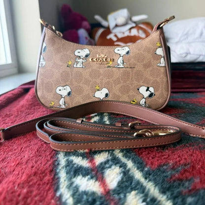 3. Coach Teri Shoulder Bag x Peanuts Snoopy Signature Canvas